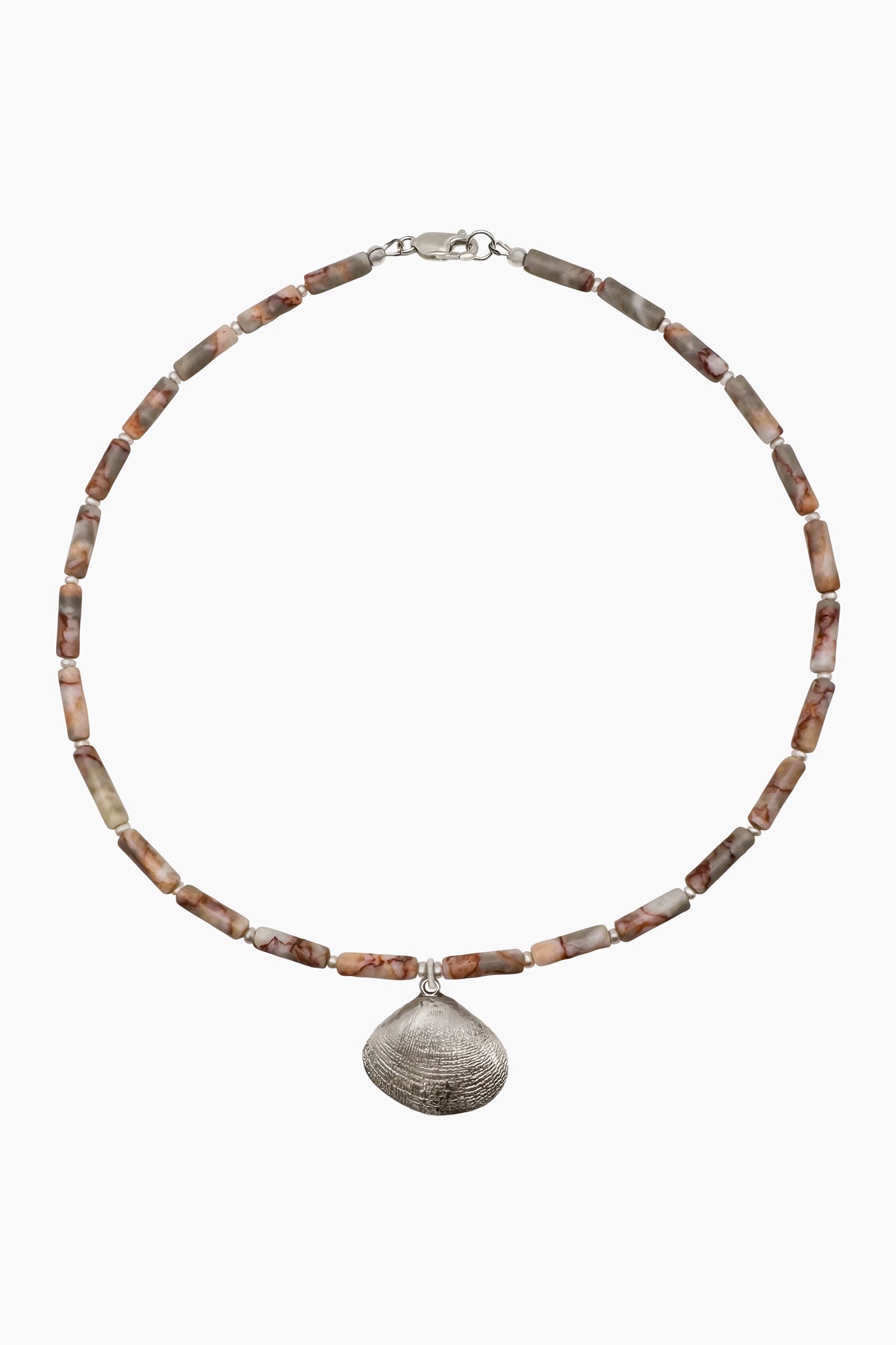 Close-up of the Caroline Necklace, a handcrafted piece featuring jasper and freshwater pearls with a sterling silver-plated clam shell pendant.