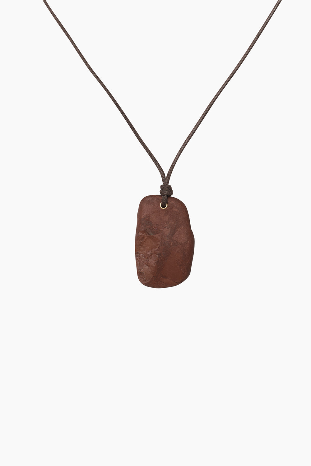 Erode Necklace featuring a burgundy stone pendant on a dark brown waxed cotton cord with 14k gold-filled accent