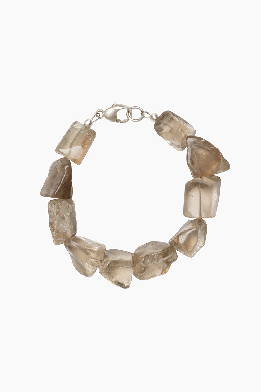 Fragments Bracelet in smoky quartz, featuring chunky tumbled smoky quartz gemstones in translucent grey-brown tones, photographed on white background.