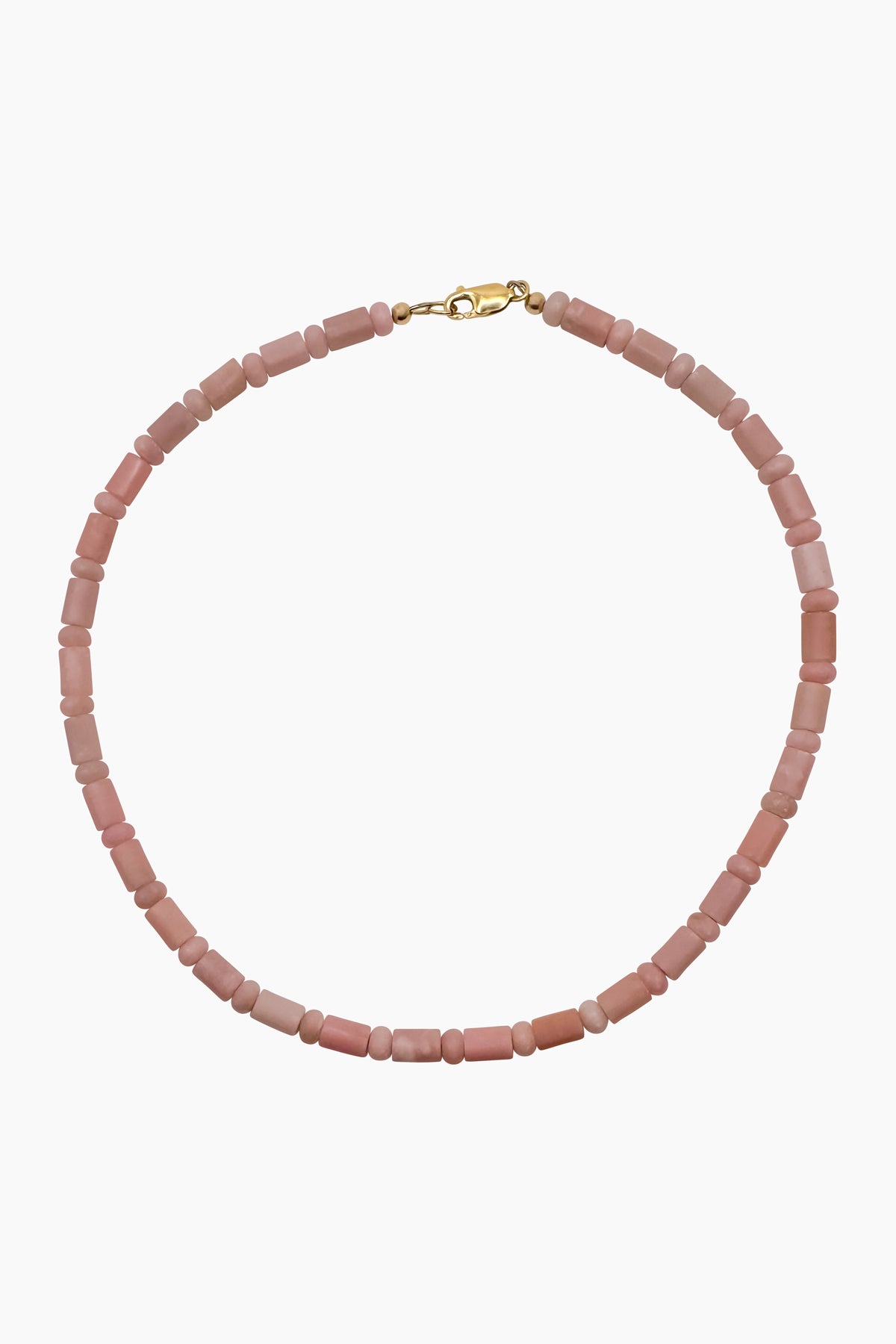 Close-up of the Lottie Necklace, a pink opal beaded necklace with a 14K gold-filled lobster clasp. Showcasing soft hues, organic shapes, and natural textures.