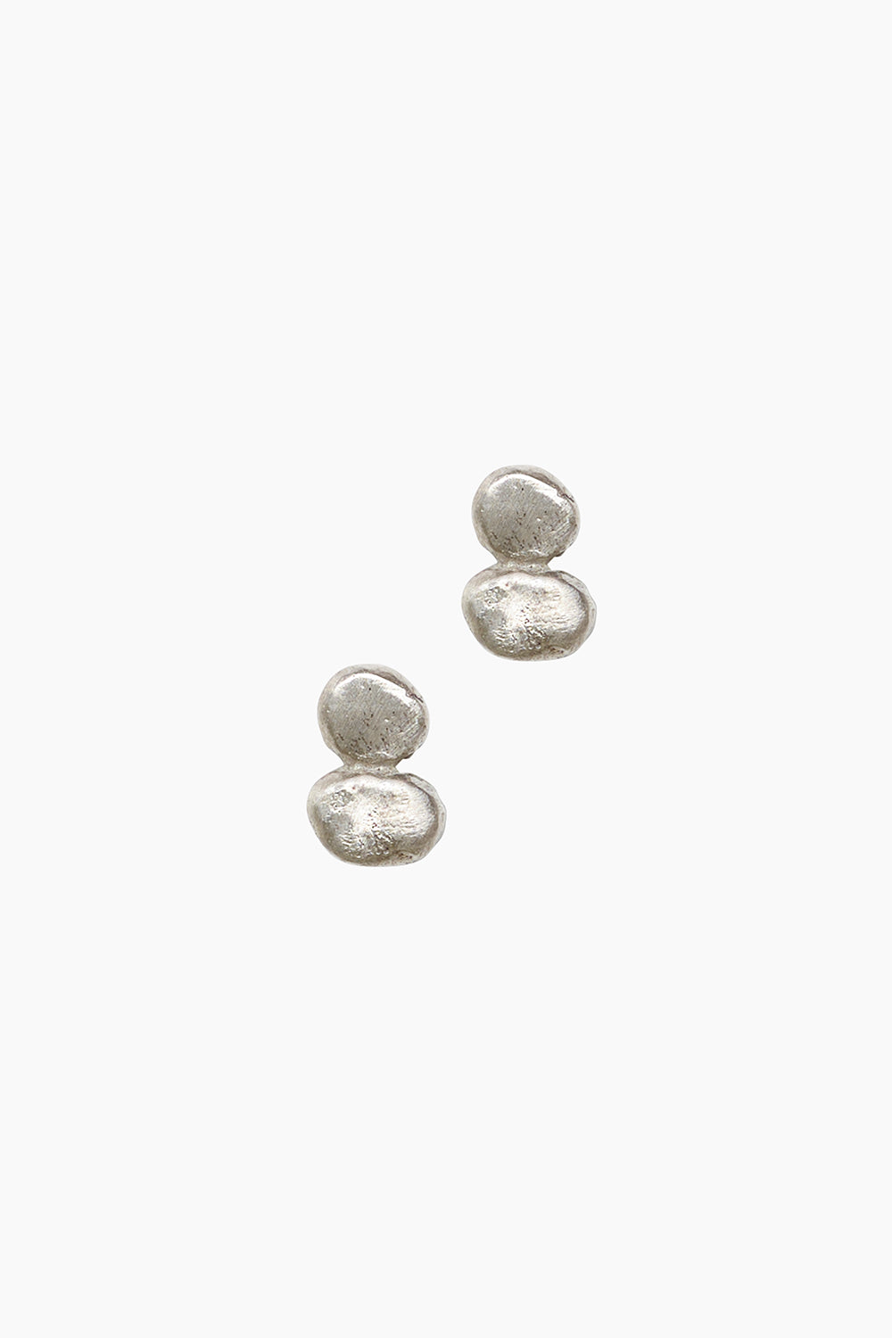 Front view of the Mirage Earrings — organic sterling silver pebble studs.