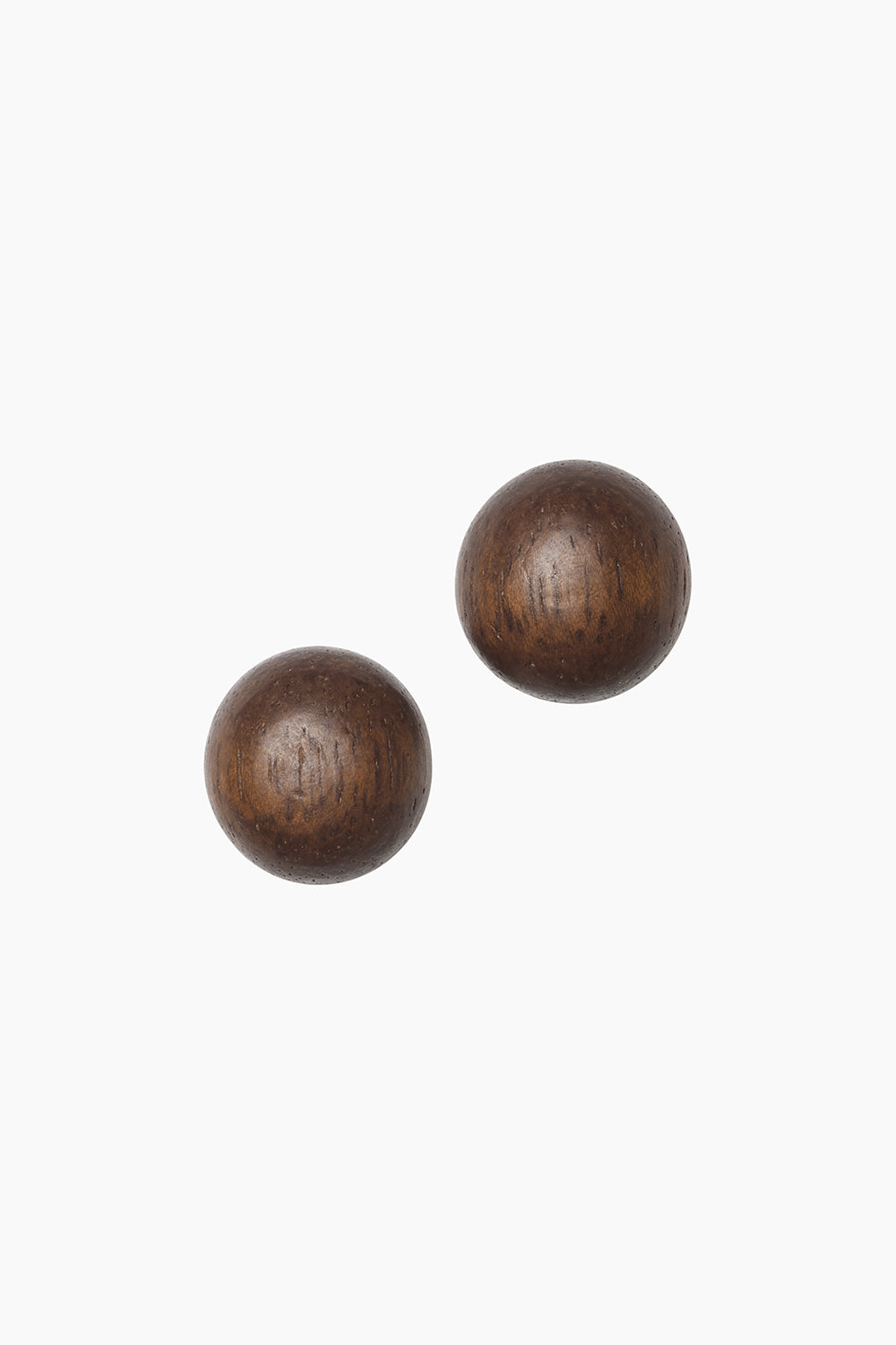 The Mound Earrings — natural wood dome stud earrings with smooth rounded surface, finished with 14k gold-filled posts, product photo on white background.