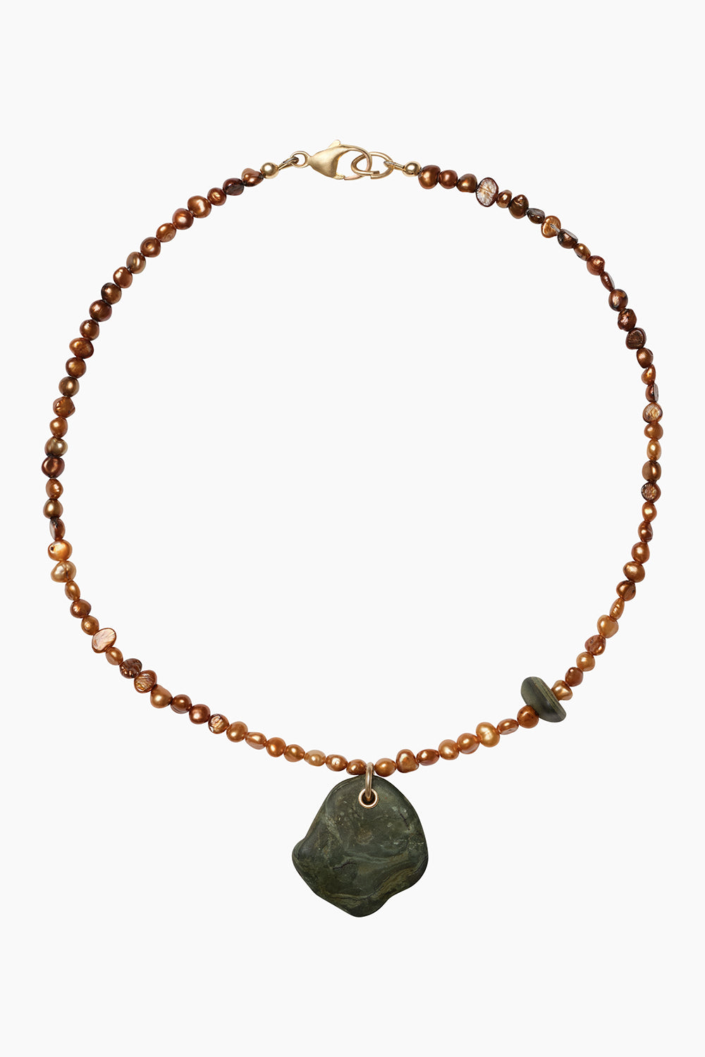 Ode Necklace — earthy freshwater pearl strand with a stone bead and pendant, photographed on a white background.