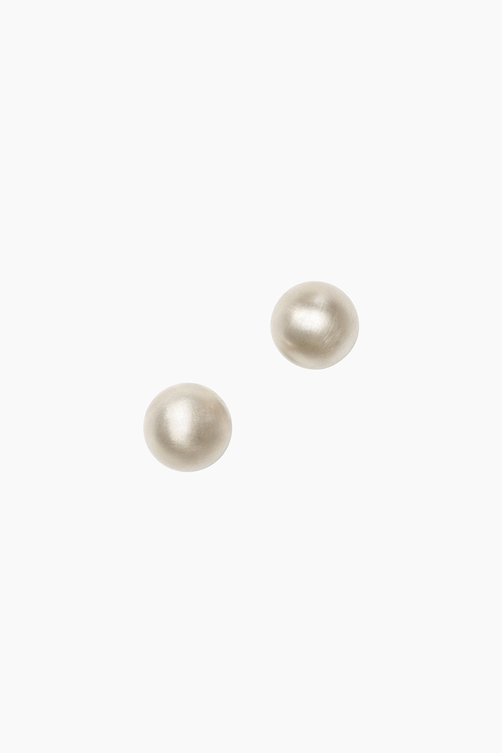 The Orb Earrings — oversized sterling silver ball studs, photographed against a white background.