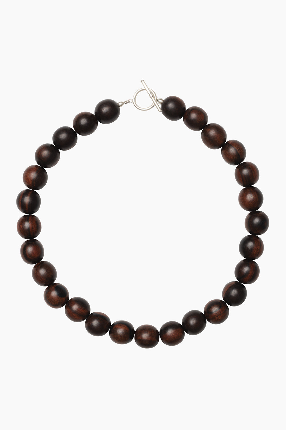 Totem Necklace — strand of sculptural kamagong wood beads in deep brown tones, photographed on a white background.