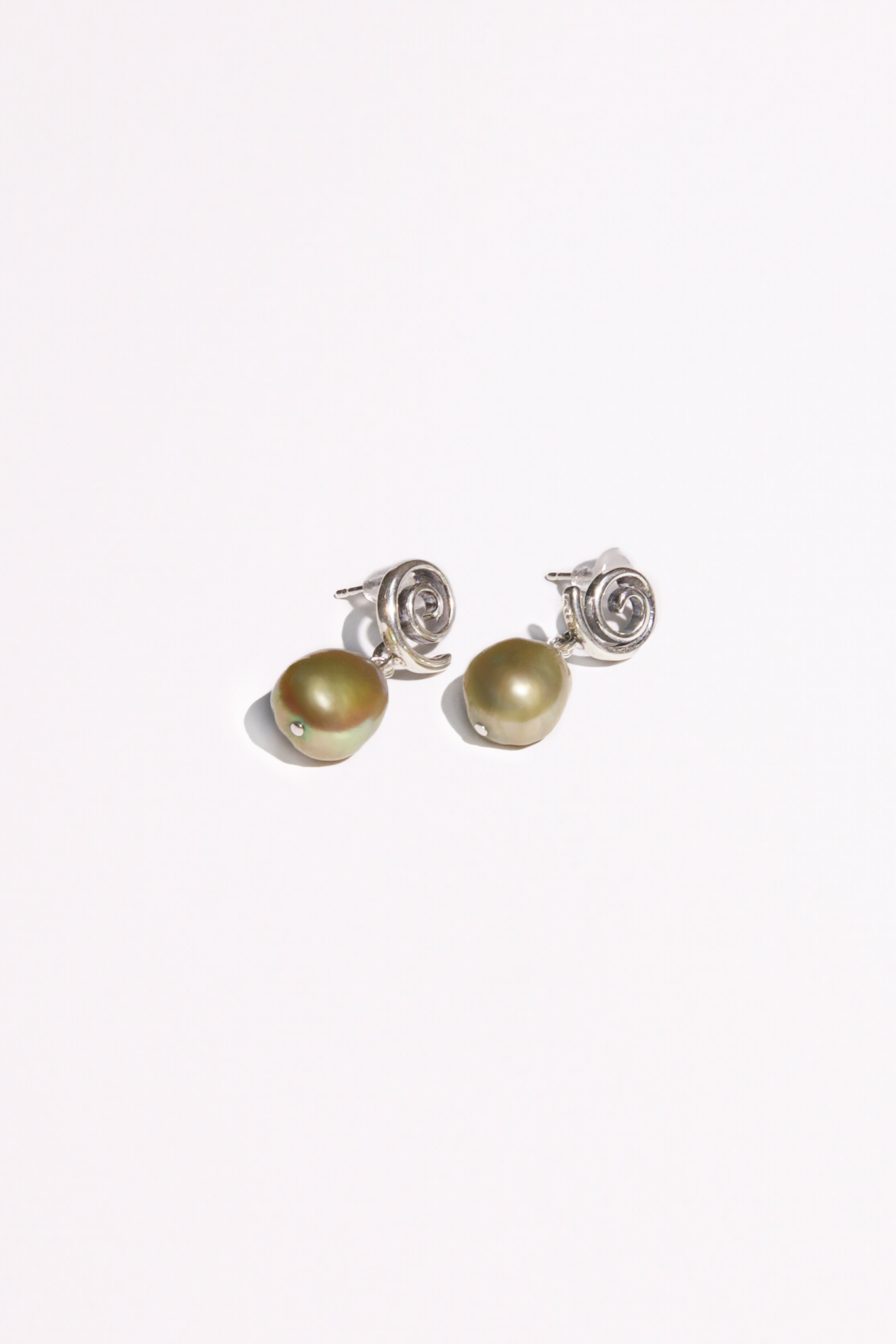 Solid .925 Sterling Silver spiral earrings with freshwater baroque pearl drops.