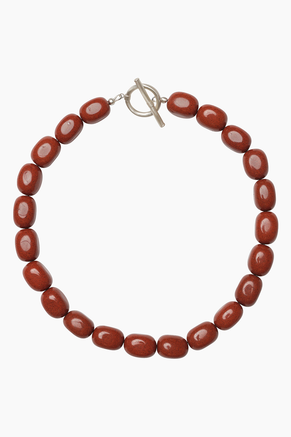 Mantle Necklace — chunky strand of tumbled red jasper beads in deep burgundy and earthy red tones, photographed on white background.