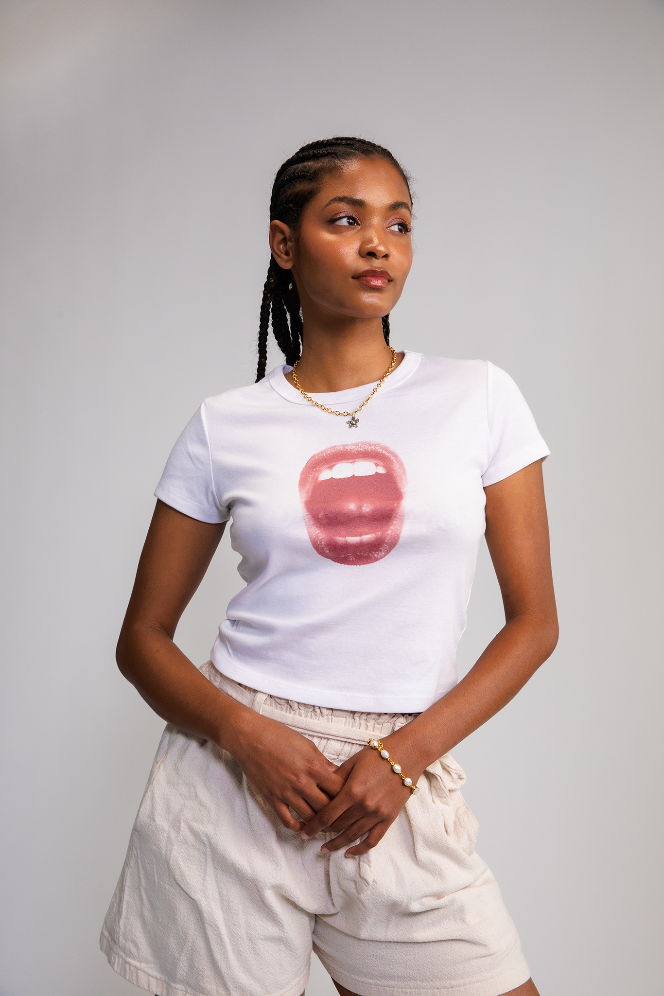 Fitted white tee featuring a red screaming mouth