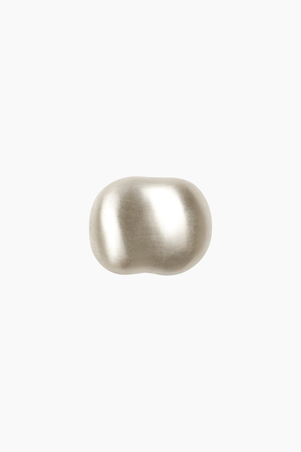 The Vessel Ring by cocoatemyshoes — top view showing the silver dome’s smooth matte texture and vintage modernist shape.