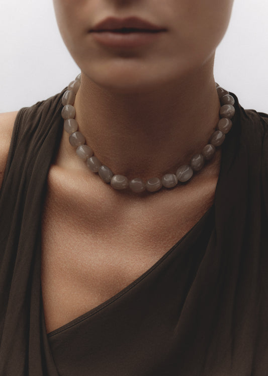 The Echo Necklace — moonstone bead necklace worn around the neck