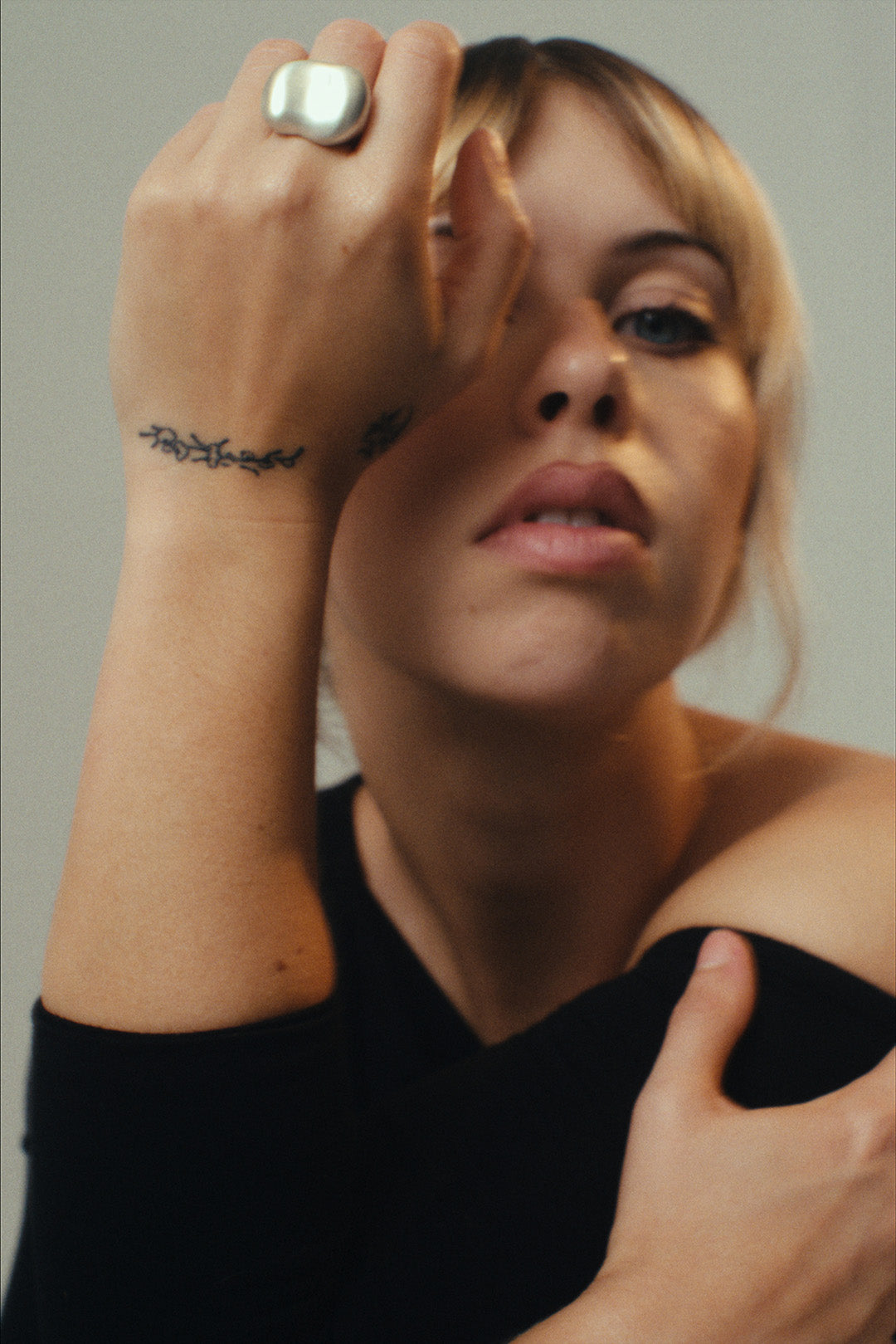 The Vessel Ring by cocoatemyshoes — a modernist, vintage-inspired silver ring with fluid, sculptural curves and a bold, statement form on the hand.